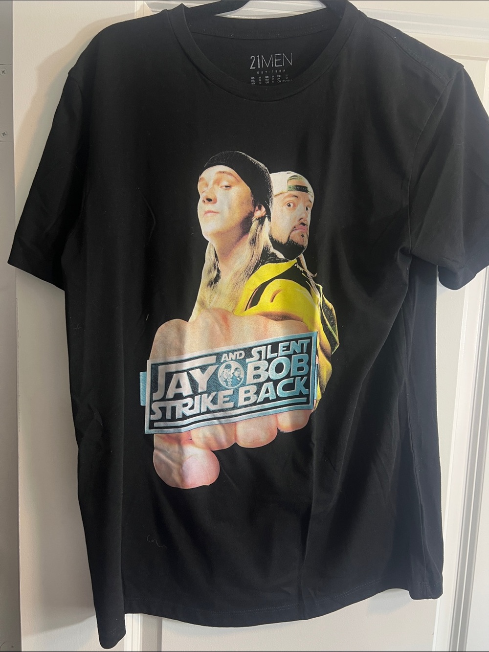 21men Black 'Jay and Silent Bob Strike Back' Graphic Tee with Yellow Accent